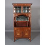 AN ART NOUVEAU MAHOGANY AND INLAID DISPLAY CABINET inlaid in copper, satinwood and harewood with