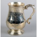 A VICTORIAN SILVER TANKARD by James and Josiah Williams, Exeter 1874, the baluster body engraved