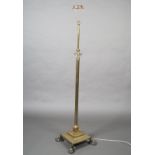 AN EDWARD VII BRASS TELESCOPIC CORINTHIAN COLUMN STANDARD LAMP on a square stepped base and on brass