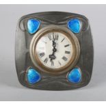 A LIBERTY'S TUDRIC PEWTER CLOCK CASE, early 20th century of rounded square form with blue