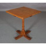 BOB HUNTER OF THIRLBY WRENMAN AN OAK PEDESTAL TABLE, square, on an octagonal and stiff leaf collar
