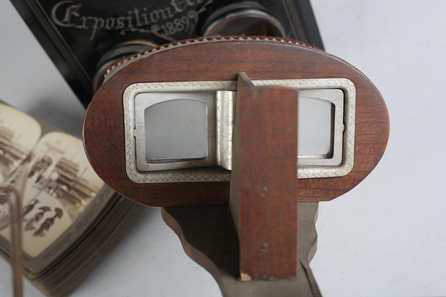 A 19TH CENTURY EBONISED GRAPHOSCOPE TABLE TOP STEREO CARD VIEWER, the cover inscribed Exposition - Image 4 of 7