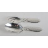 A CHILD'S DANISH STERLING SILVER SPOON AND FORK by Georg Jensen, London import mark for 1937, cactus