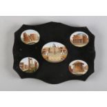 AN ITALIAN MICRO MOSAIC AND BLACK SLATE PLAQUE inlaid with five oval views of Rome including St.