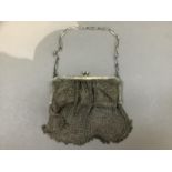 A silver wire mesh evening purse on a chain Chester import mark for 1915, 8oz
