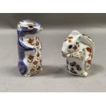 Two Royal Crown Derby paperweights in the form of a squirrel and a chipmunk, gold buttons to