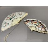 Two 19th century Chinese goose feather fans, the first with a carved ivory monture, the guards