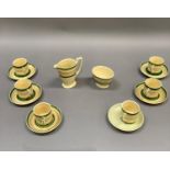 A Mintons fourteen piece coffee service, circa 1930s, comprising six cans, five saucers, cream jug