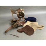 Two leather horse saddles, a saddle stand and various items of tack