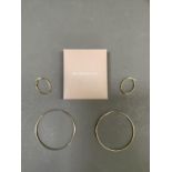 Two pairs of hoop earrings both in 9ct gold, total approximate weight 4g