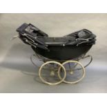 A vintage Silver Cross pram with double hood for twins