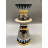 A Moorland vase of Art Deco style having everted rim, a bladed knop and tapered body, banded in