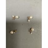 Two pair of cultural pearl earrings both on 9ct gold stud fitting, one pair A/F
