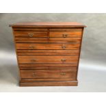A late 19th century walnut and ebony details chest of two short and three long graduated drawers