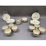 A Royal Doulton tea service The Coppice comprising eight cups, seven saucers, eight tea plates,