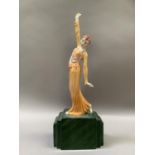 A Manor limited edition Art Deco series dancer no 22/750, raised on a green stepped integral base,