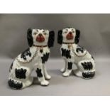 A pair of reproduction Staffordshire style spaniels