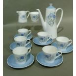 A Royal Tuscan china coffee service comprising a coffee pot, sugar and cream, six coffee cans and