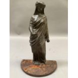A bronzed classical female furniture mount, now filled and on a cast iron semi circular base,