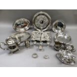 A three piece silver plated tea service, rectangular cake basket, double lipped sauce boat and