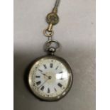 A late 19th century fob watch in an open faced silver case, Swiss cylinder movement, white enamelled