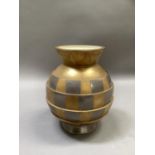 A Moorland vase of Deco design, the spherical body stepped and with alternating pewter and gilt