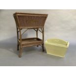 An early 20th century work basket table, lift up lid and under tier, together with a green painted