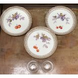 A Victorian china tazza and three dessert plates, painted in gilt with blossom and cherries within a