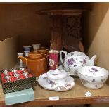 A hardwood folding table, two Hornsea style teapots, one with a double spout, Caverswall china