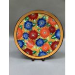 A Dean Sherwin hand painted plaque entitled New Bloom, no.4/50,37.5cm diameter