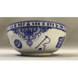 A large Spode blue and white bowl from the Edwardian Childhood range, printed with rocking horse,