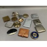 A quantity of compacts, cigarette cases and lighters