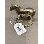 A silver model of a shire horse on circular naturalistic ground, London assay mark no date letter,