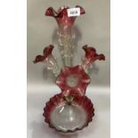 A Victorian cranberry glass and clear four flute epergne with dished base, 49cm high