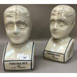 A pair of reproduction phrenology heads