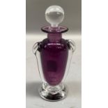 A David Wallace amethyst and clear glass scent bottle, of urn shape with spherical stopper, signed