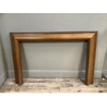 A 1930s mahogany fire surround, cushion moulded, 149cm wide x 96cm high, the inner measurements