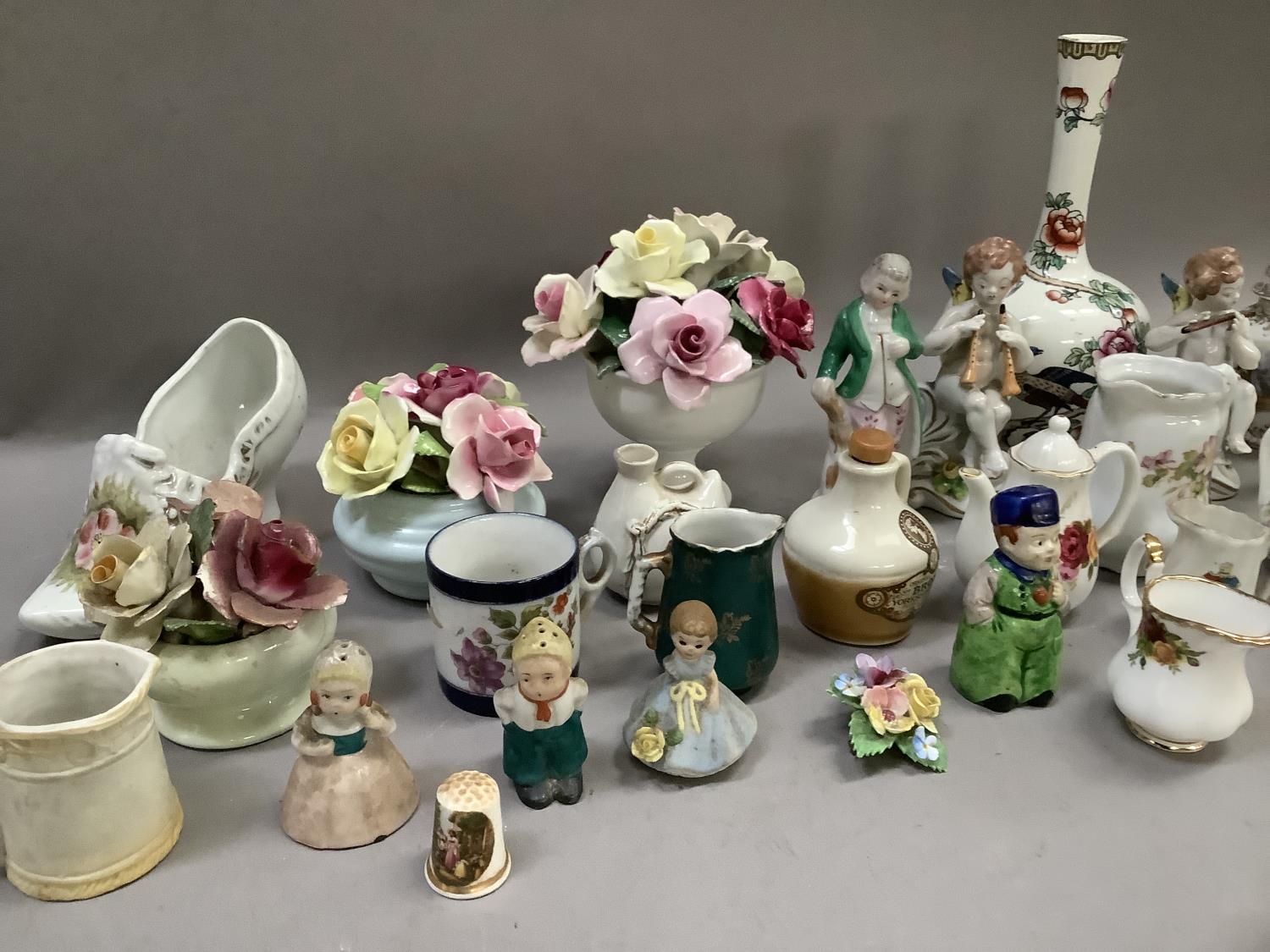 A collection of flower clusters, cherub figures, Old Country Roses miniature jug, vases, - Image 3 of 3