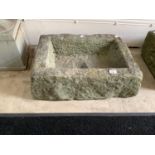 A small stone trough, 60cm x 19cm x 46cm deep, with drilled drainage hole