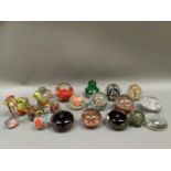 A collection of glass paperweights, five in the form of chickens and ducks