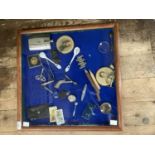 Items of bijouterie including magnifying glass, spoons, spirit flask, coins, cigarette cards, clay