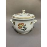 A Herend porcelain ice pail and cover polychrome hand painted with flowers and fruits highlighted in
