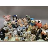 A pair of Sylvac rabbits, a Nat West pig money bank, a Winstanley kitten, various dog and cat