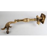 A Victorian lacquered brass wall sconce with foliate plate and swing arm, approximate 56cm long