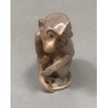 A Bing and Grondahl figure of a monkey, 8cm high