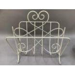 A late 1960s white wire work magazine rack, 37cm wide