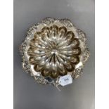 An Edward VII silver fruit bowl, fluted and with foliate pierced wavy rim on a fluted pedestal,