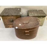 Two metal coal boxes together with a tin hat box