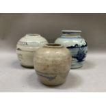 A Chinese stoneware blue and white ginger jar and cover painted with a continuous river and island