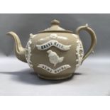 A large stoneware teapot of buff colour, sprigged in white with basket of flowers and cartouche,